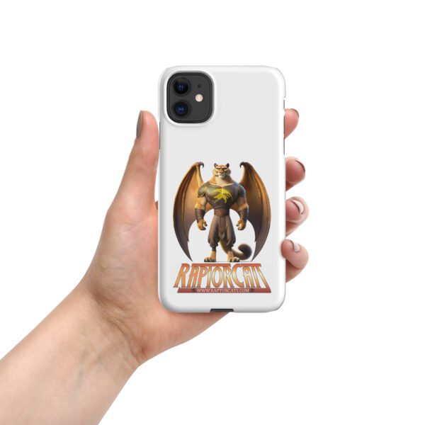 A hand holding an iphone case with a picture of a dragon on it.