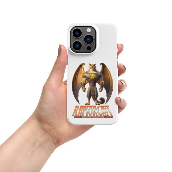 A hand holding an iphone case with a dragon on it.