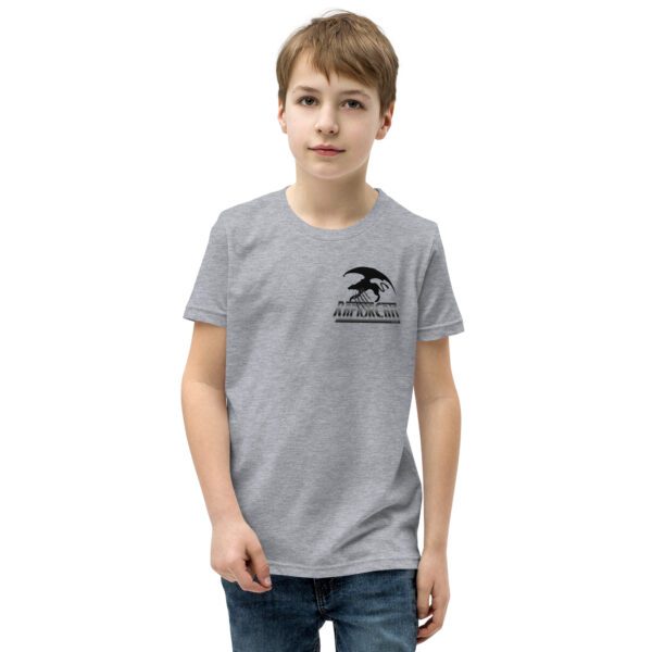 A boy wearing a t-shirt with the words " no image."