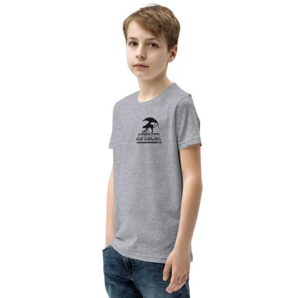 A boy wearing a t-shirt with the words " i am a child of god ".