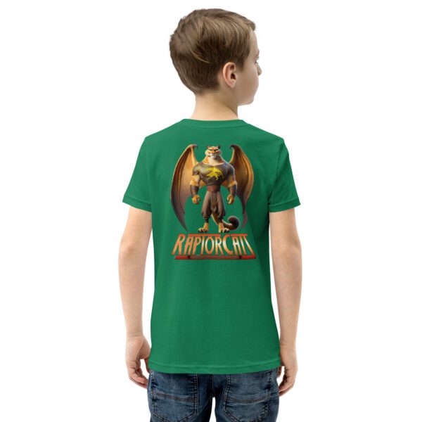 A boy wearing a green shirt with an image of a dragon on it.