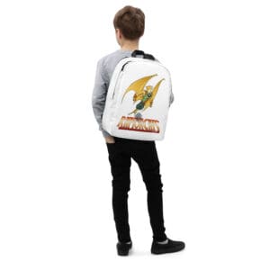 Boy wearing backpack with dragon design.