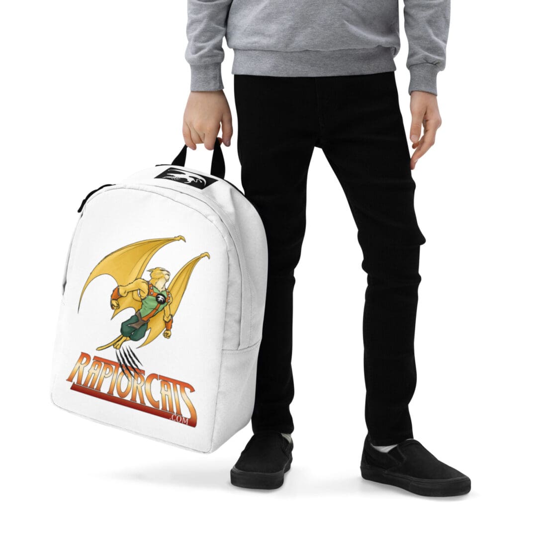 Person holding backpack with winged character design.