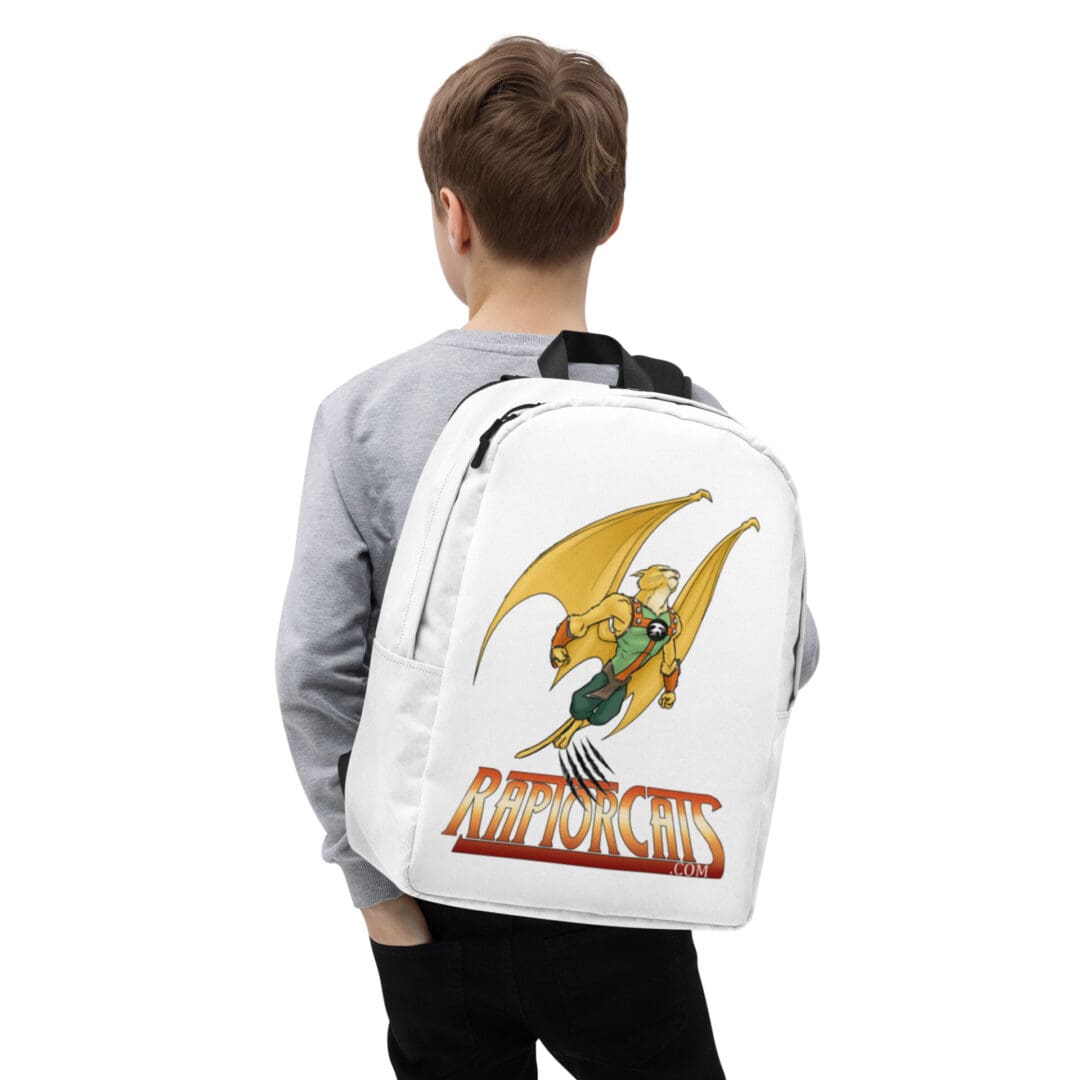 Boy wearing backpack with cartoon design.