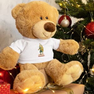 Teddy bear with Christmas decorations and lights.