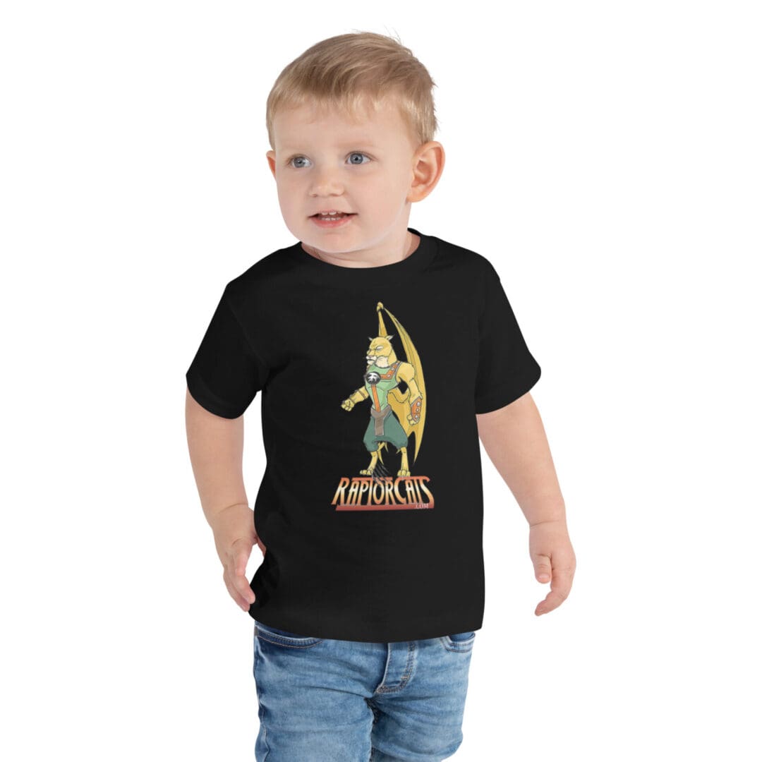Toddler wearing Raptor Cats t-shirt, smiling.