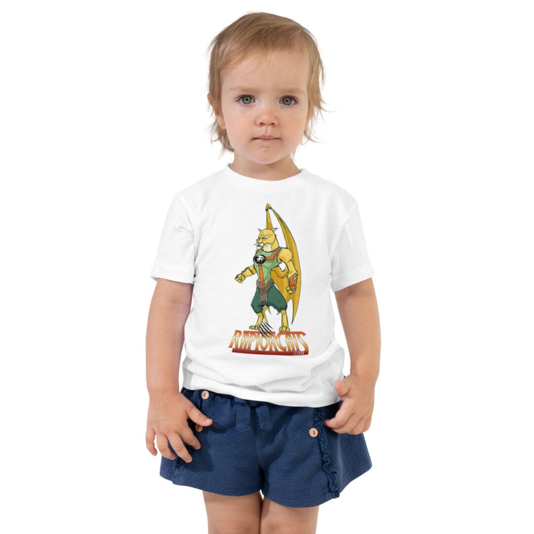 Toddler wearing a T-shirt with cartoon design.